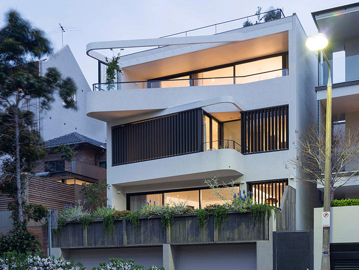 Stunning exterior of a dwelling with two beautiful apartments in Sydney by Luigi Rosselli Architects