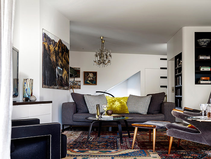 Living room design idea: eclectic mix of furnishings and art in a stunning dwelling in Sydney, Australia