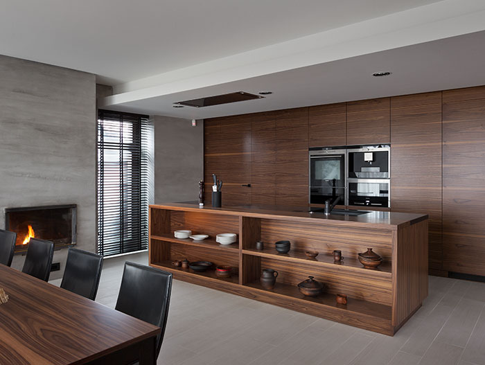 Stylish modern kitchen design finished in American walnut - Two Levels project by NOTT Design