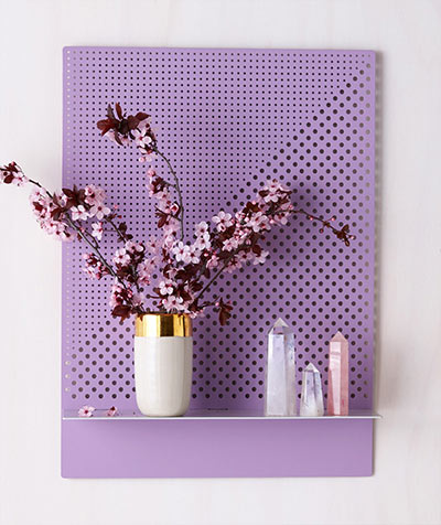 Stylish perforated wall shelves in purple color