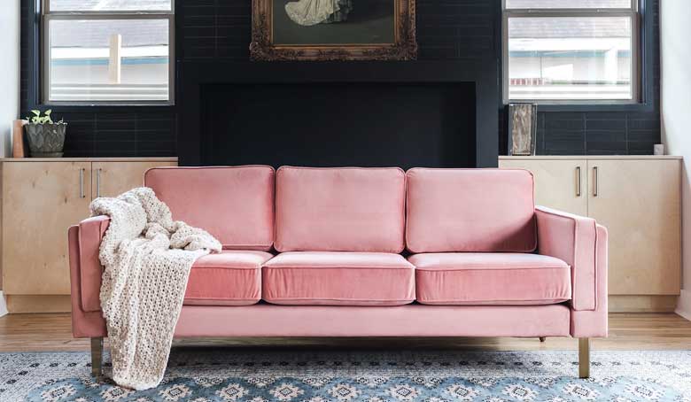 Stylish and comfortable pink velvet sofa