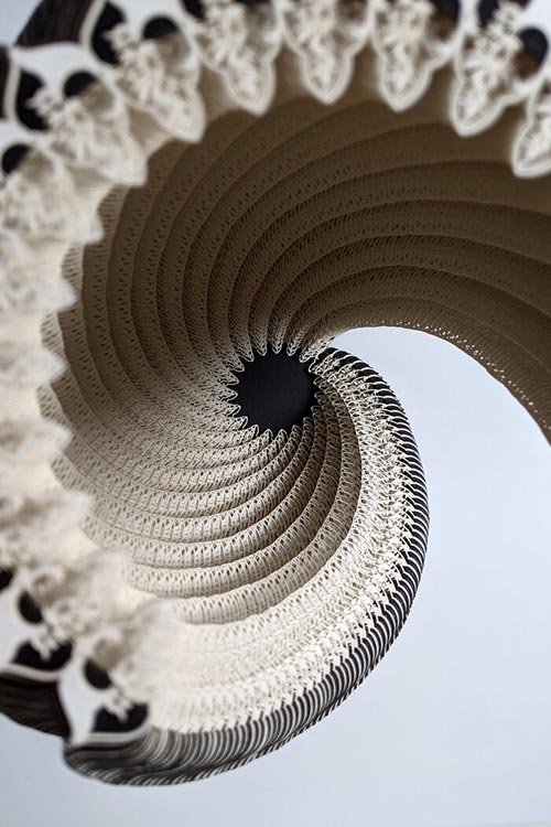 Laser-cut paper vessels created by Ibbini Studio