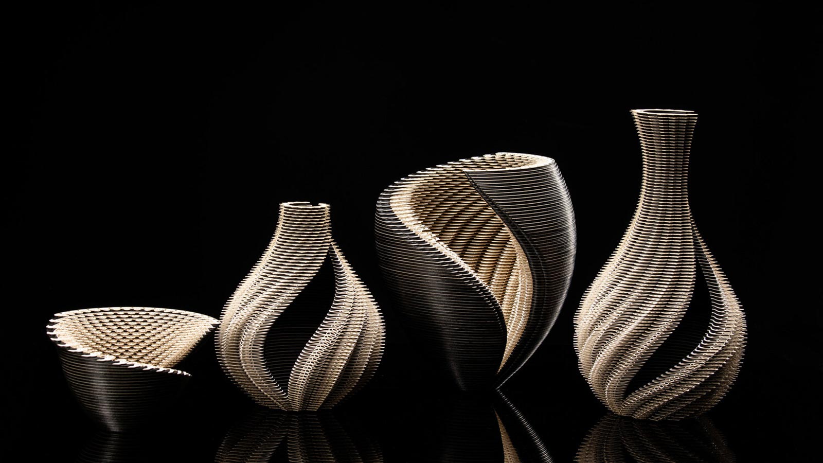 Symbio Vessels: Stunning laser-cut paper sculptures by Ibbini Studio