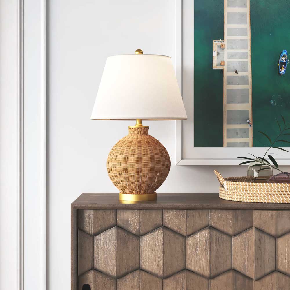 Rattan table lamp with gold finish