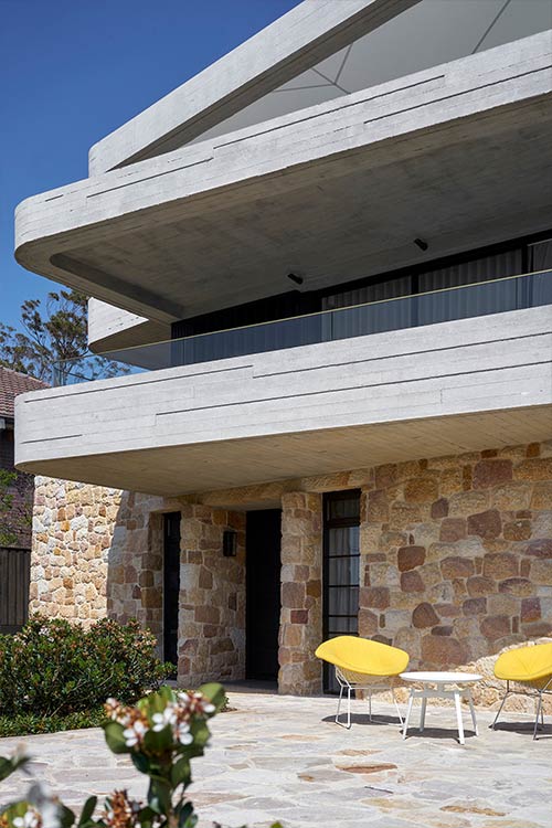 The Books House features stacked concrete slabs 