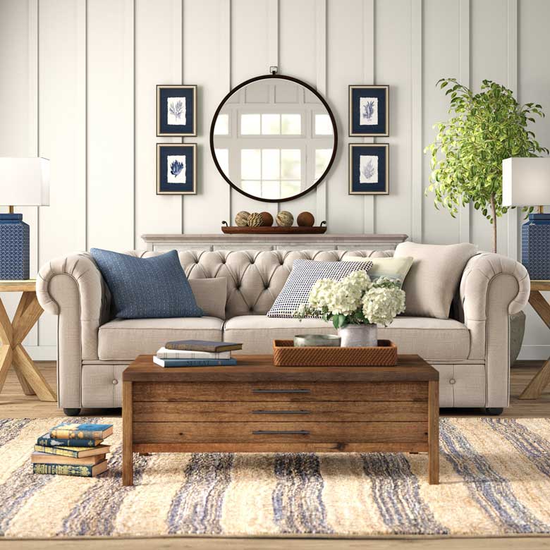 Three-seat chesterfield sofa with piped edges and button tufting