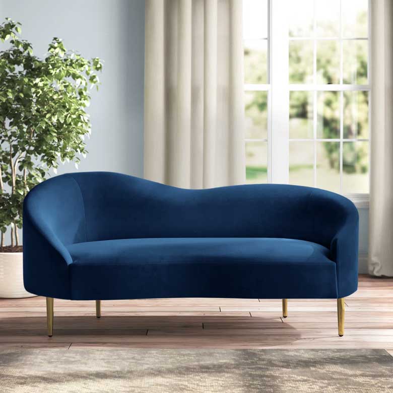 Navy blue velvet loveseat with gold legs for sale - this curved blue sofa is perfect for apartments and home offices
