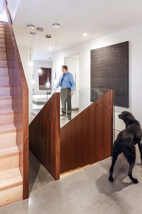 Walnut staircase in a contemporary Canadian house - design by Omar Gandhi Architect