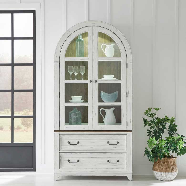 White arched curio cabinet