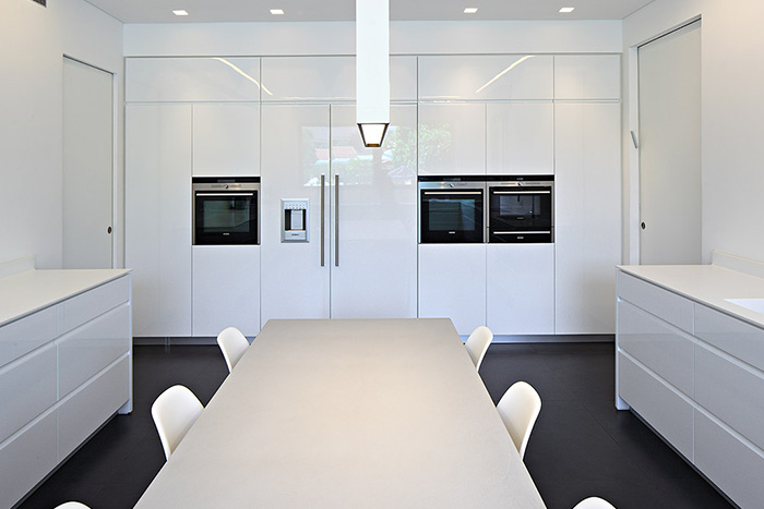 Bright and cozy family home in Israel with modern white kitchen design by Blumenfeld Moore Architects